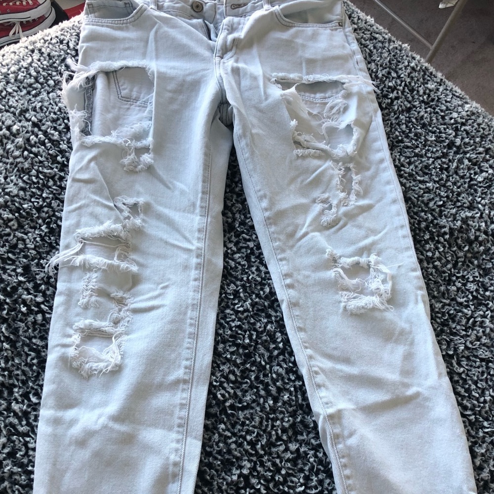 Light blue ripped jeans